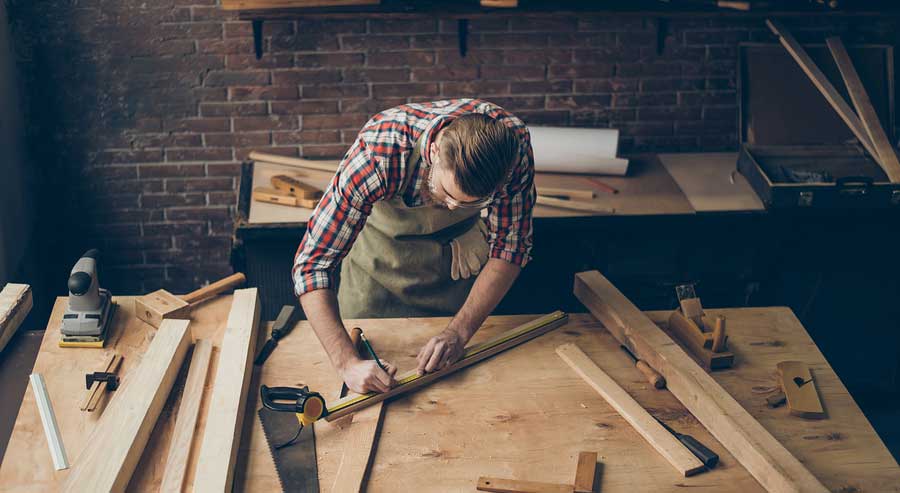 carpenter working on furniture